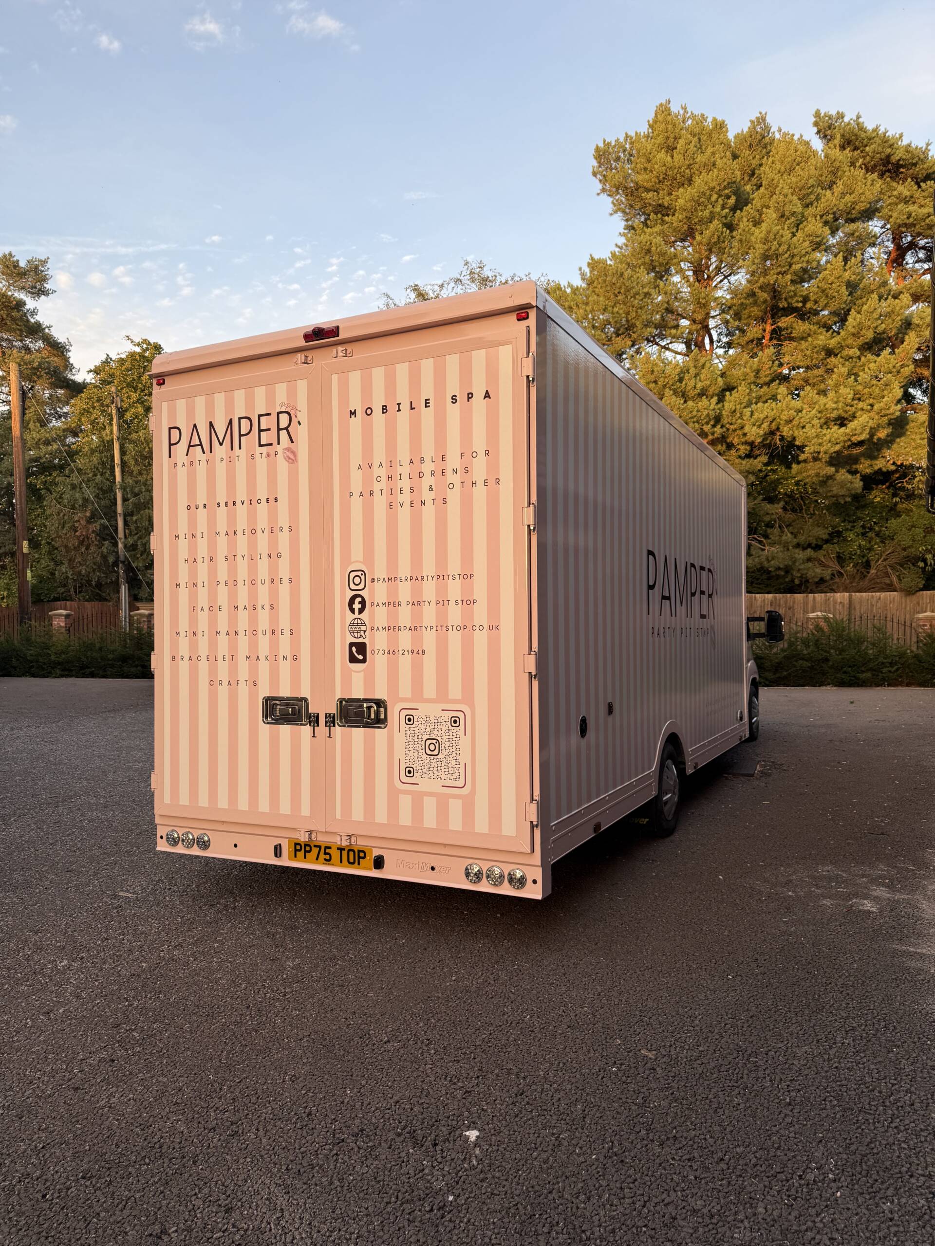 Rear view of the pink pamper van