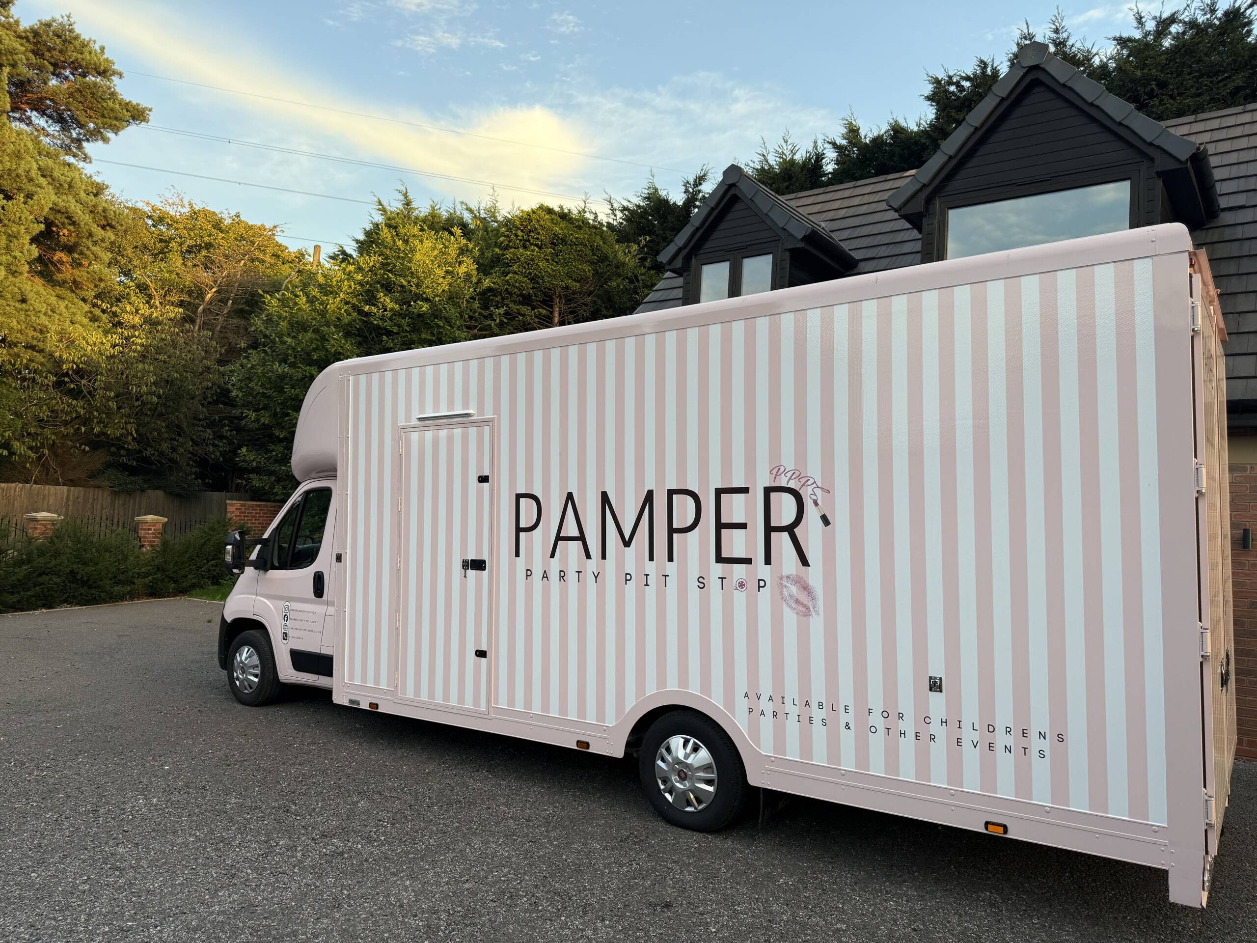 Side view of the Pamper Party Pit Stop van